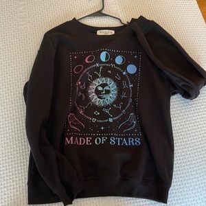 Black sweatshirt “made of stars”